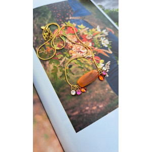 Collier téa perle ivoire végétal et zirconiums.
